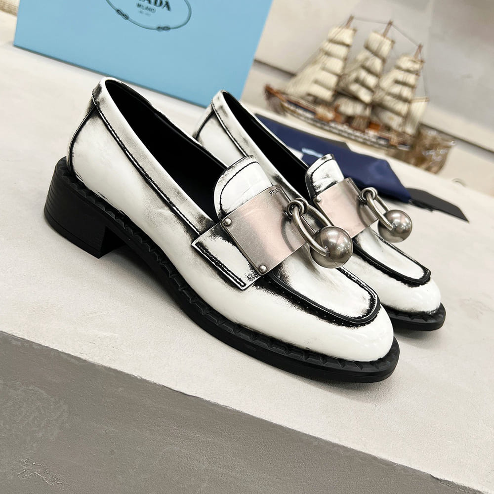 PRADA Brushed leather loafers with metal details
