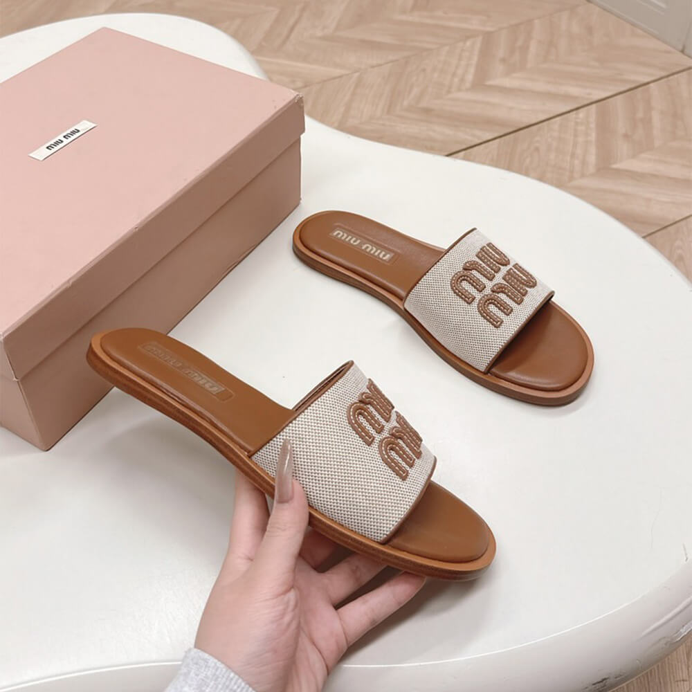 MiuMiu Canvas and leather slides